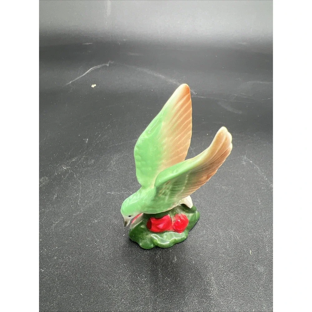 porcelain hummingbird figurine On Barry Base